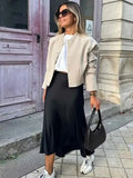 Damska spódnica midi z eleganckim krojem z satyny dla kobiet
