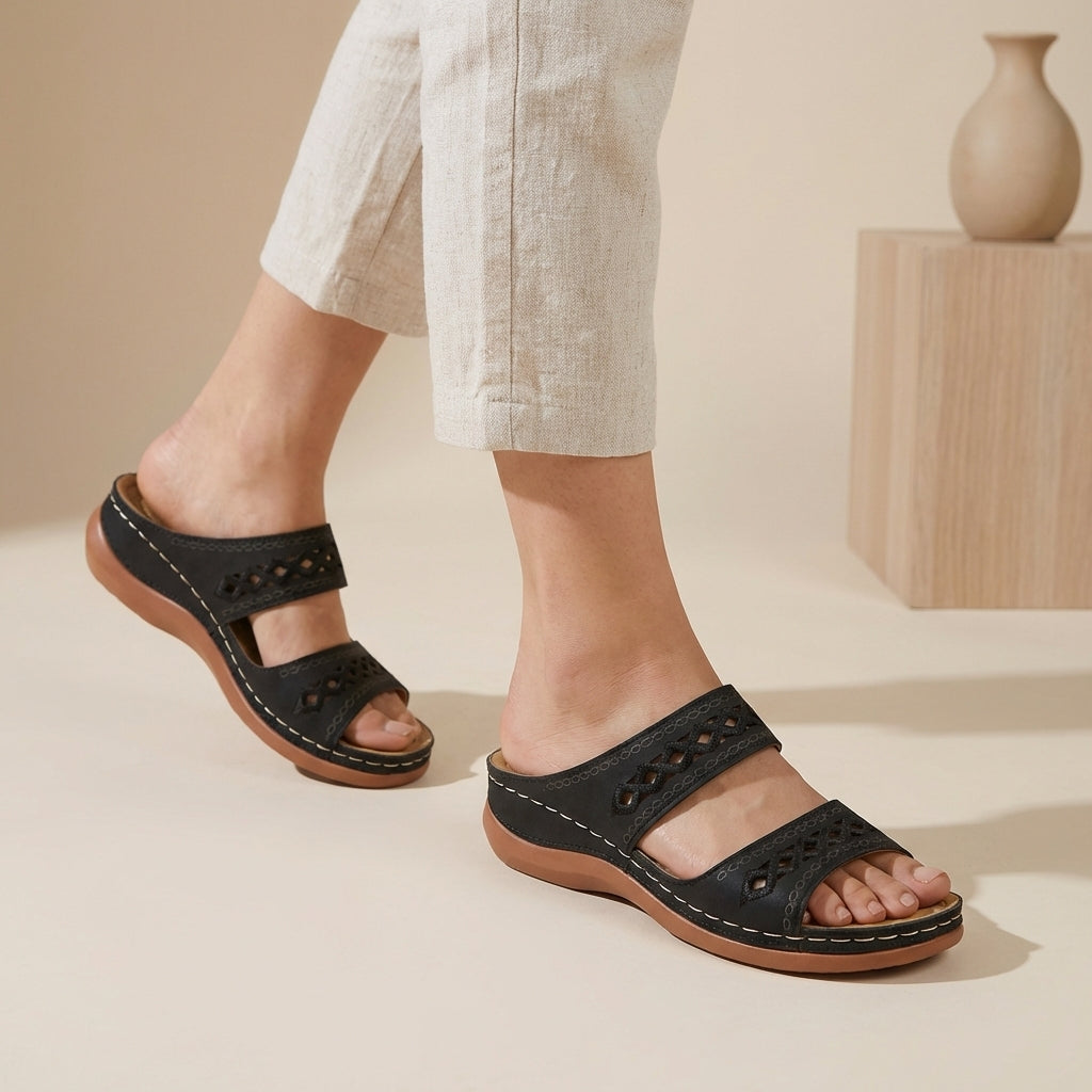 Orthopaedic double strap laser-cut sandals in Black, front view