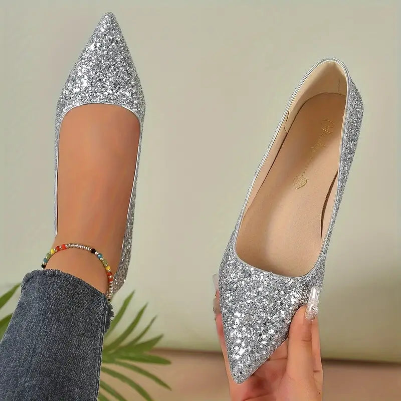 Ballerines Emilias à bout pointu pailletées pour femme, finition brillante adaptée aux tenues habillées.