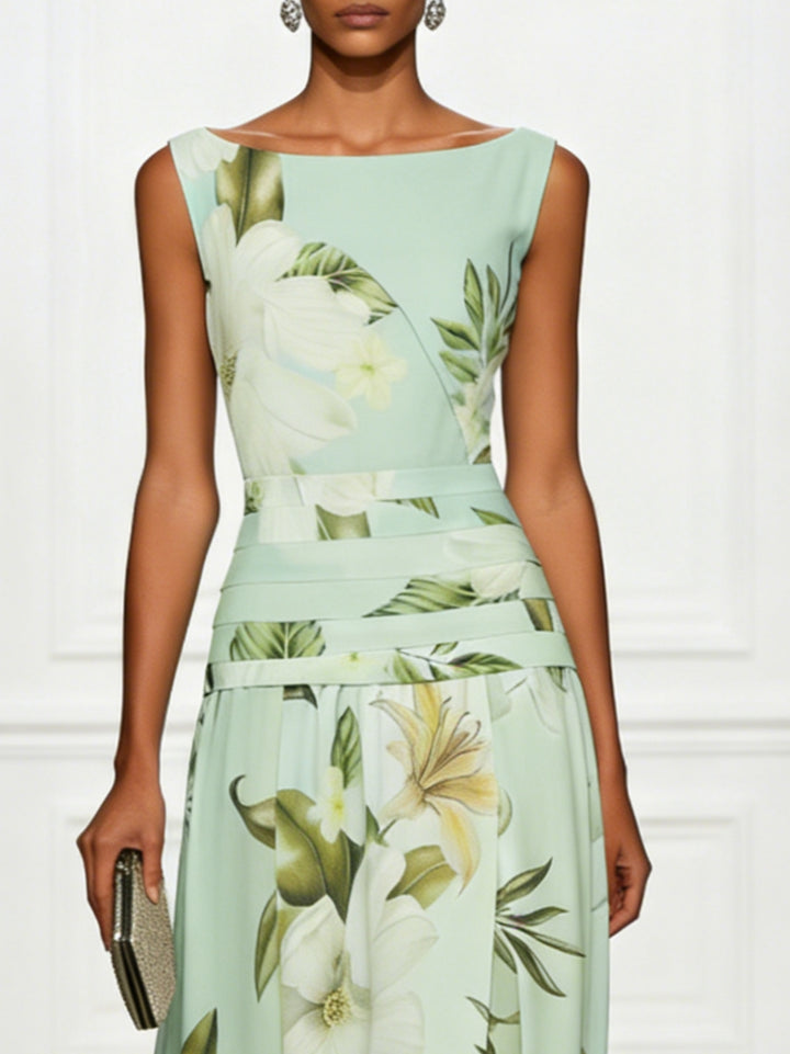 Floral maxi dress in sage green showing ruched waist detail