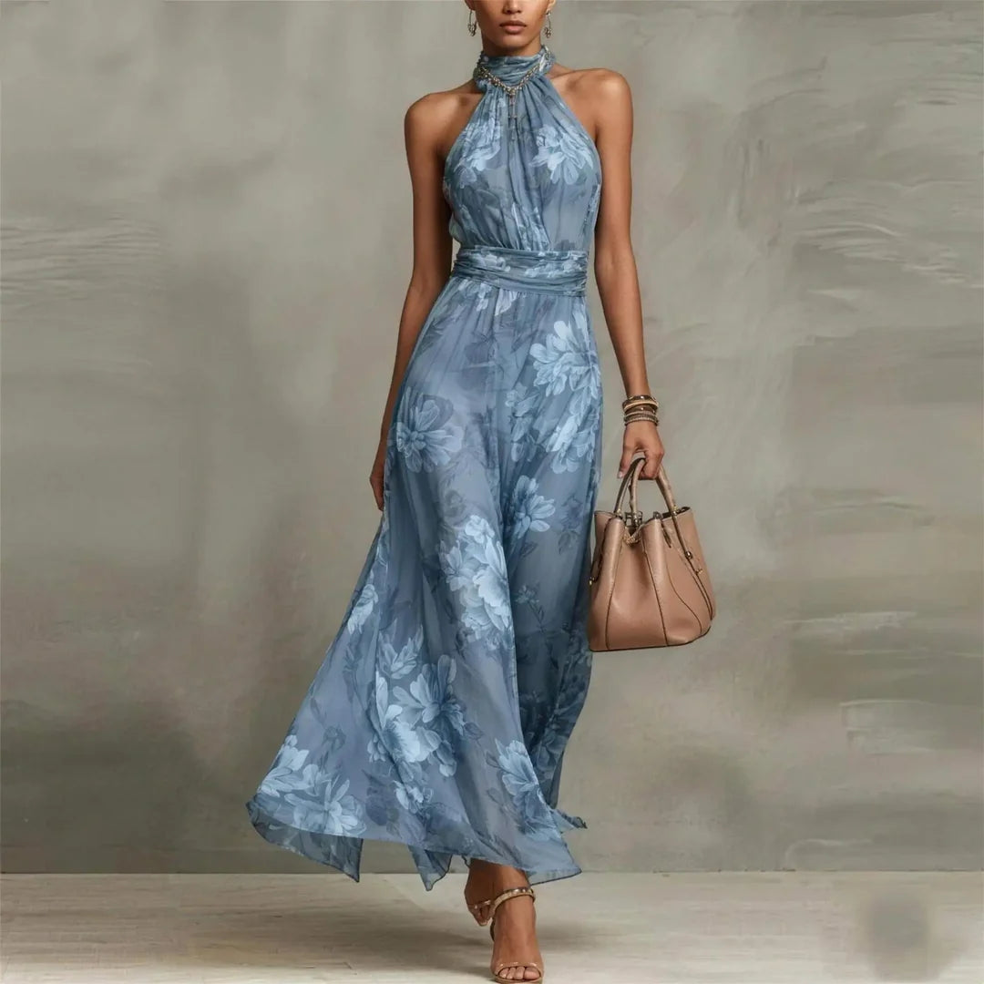 Floral halter neck wedding guest maxi dress, flowing silhouette full view